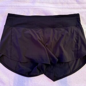 Black lululemonn size 12 tall shorts. Great conditionion